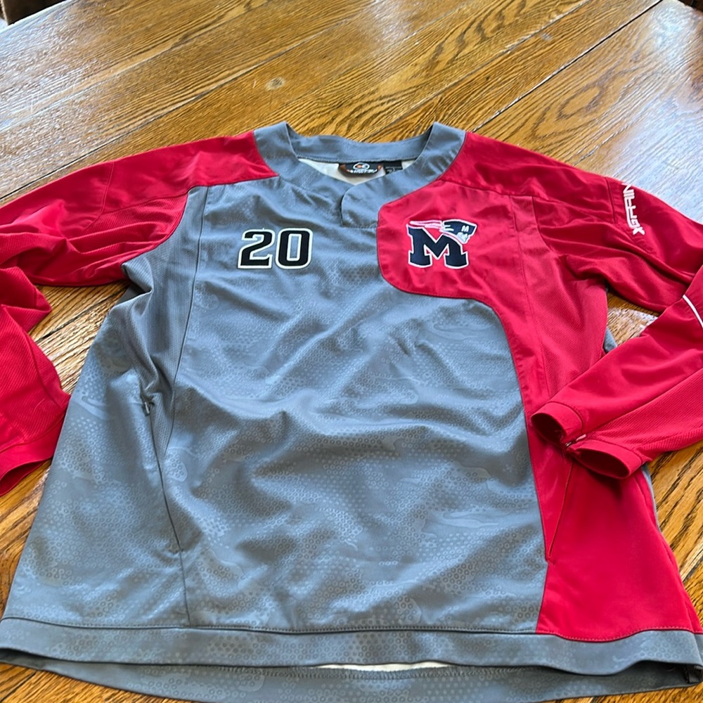 X-Grain pullover gray and red jersey.  Snaps at neck. Size Large.